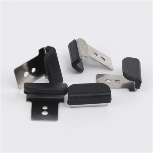 Silicone rubber overmolding on metal parts